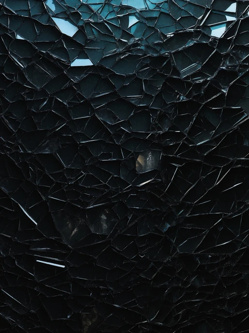 Cracked Glass Black Wallpaper
